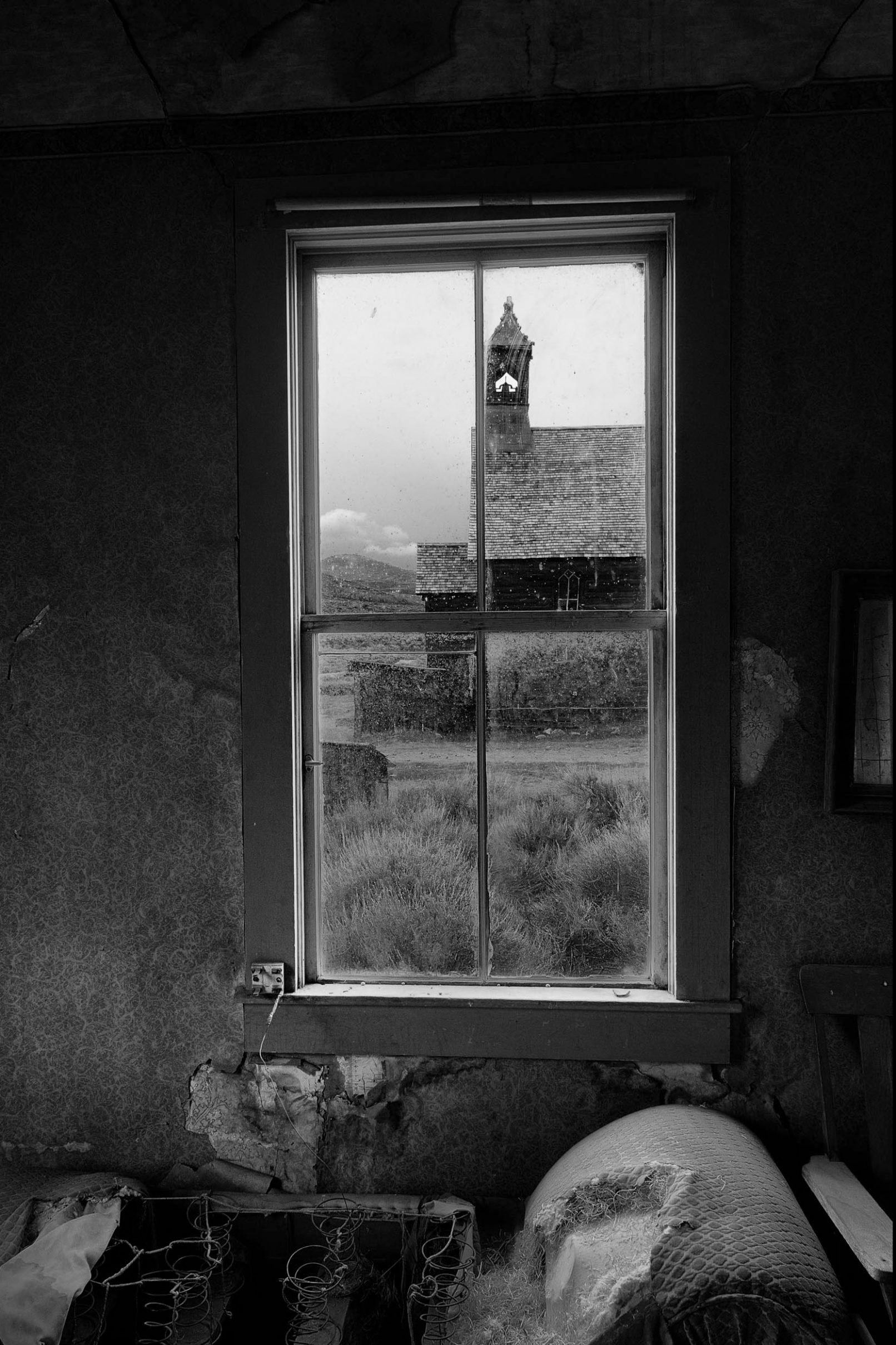 View of church from window in Bodi, California ghost town