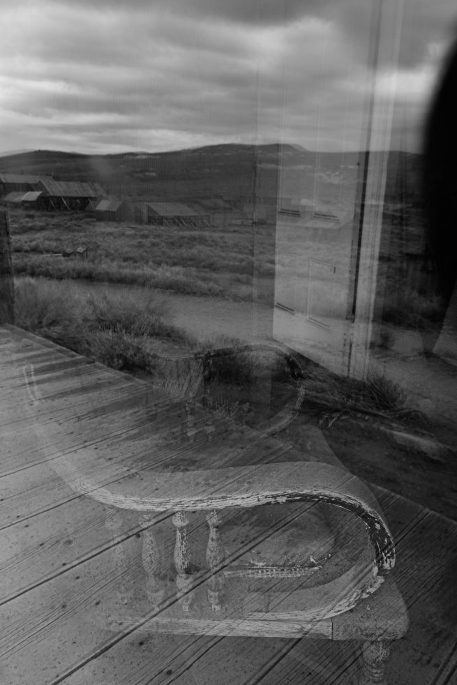 Street with reflections in Bodi, California ghost town