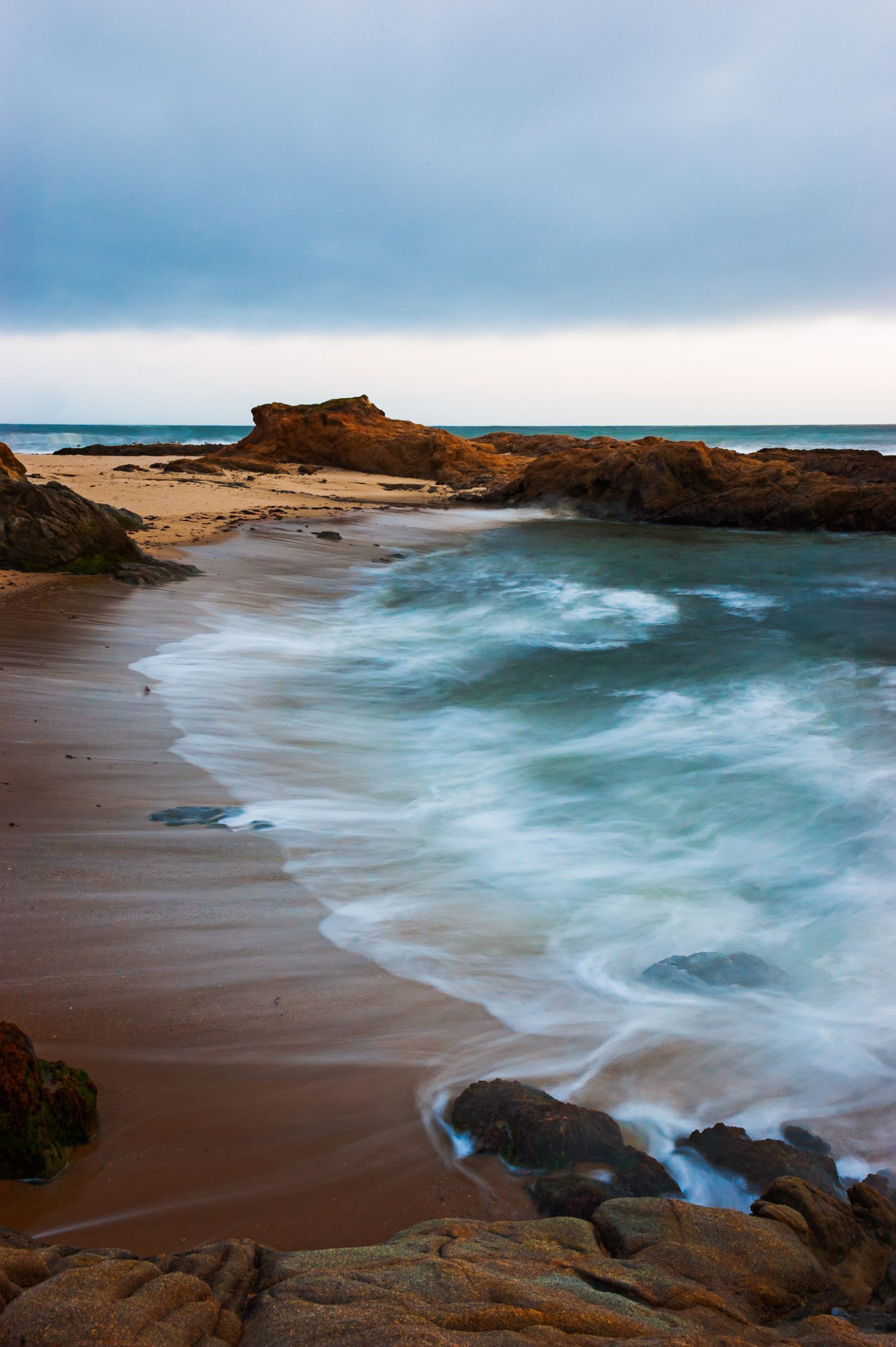 Blurred waves on California beach