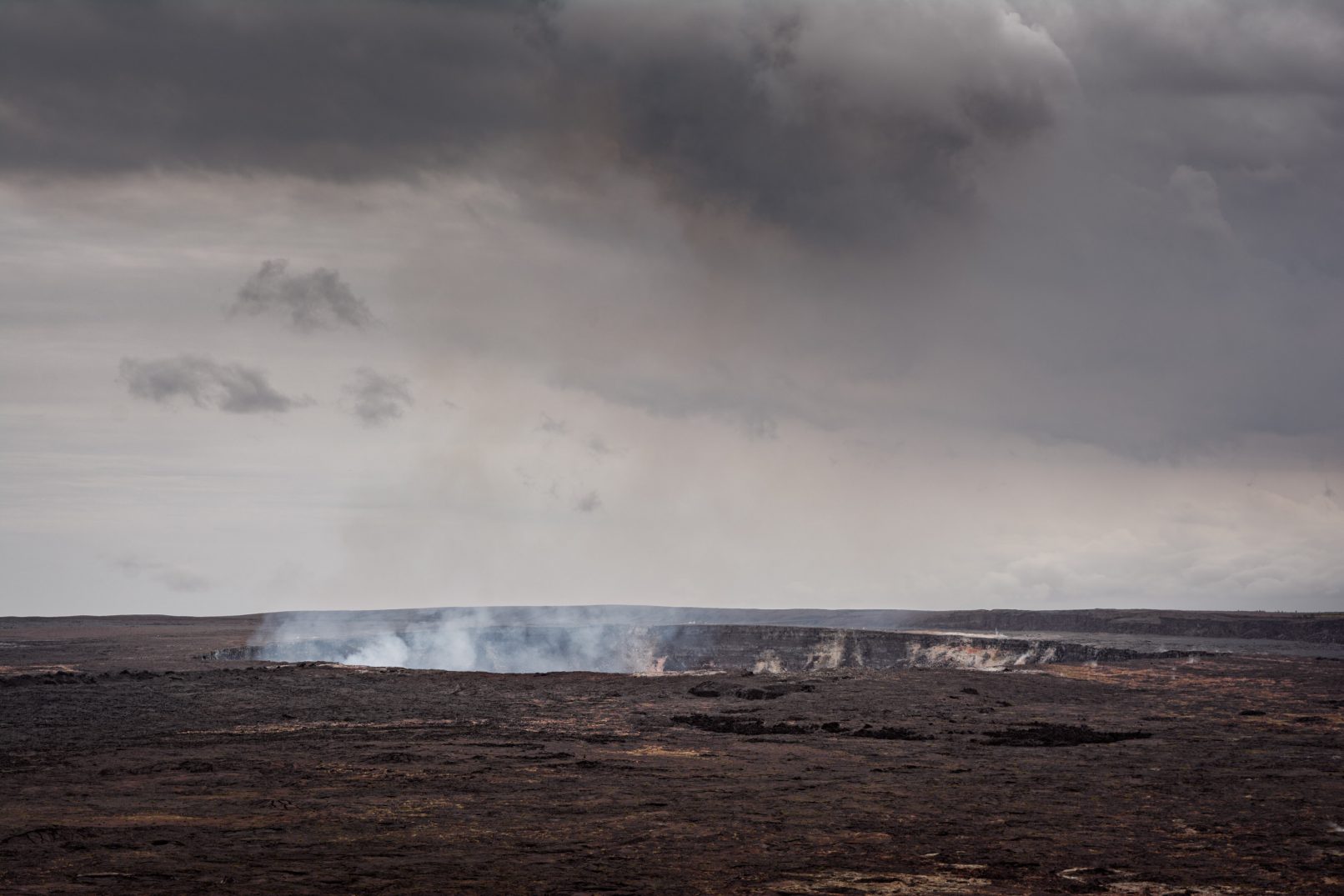 Hawaii Kilauea crater with smoke