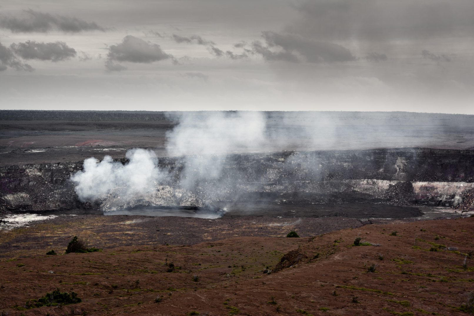 Hawaii Kilauea crater with smoke