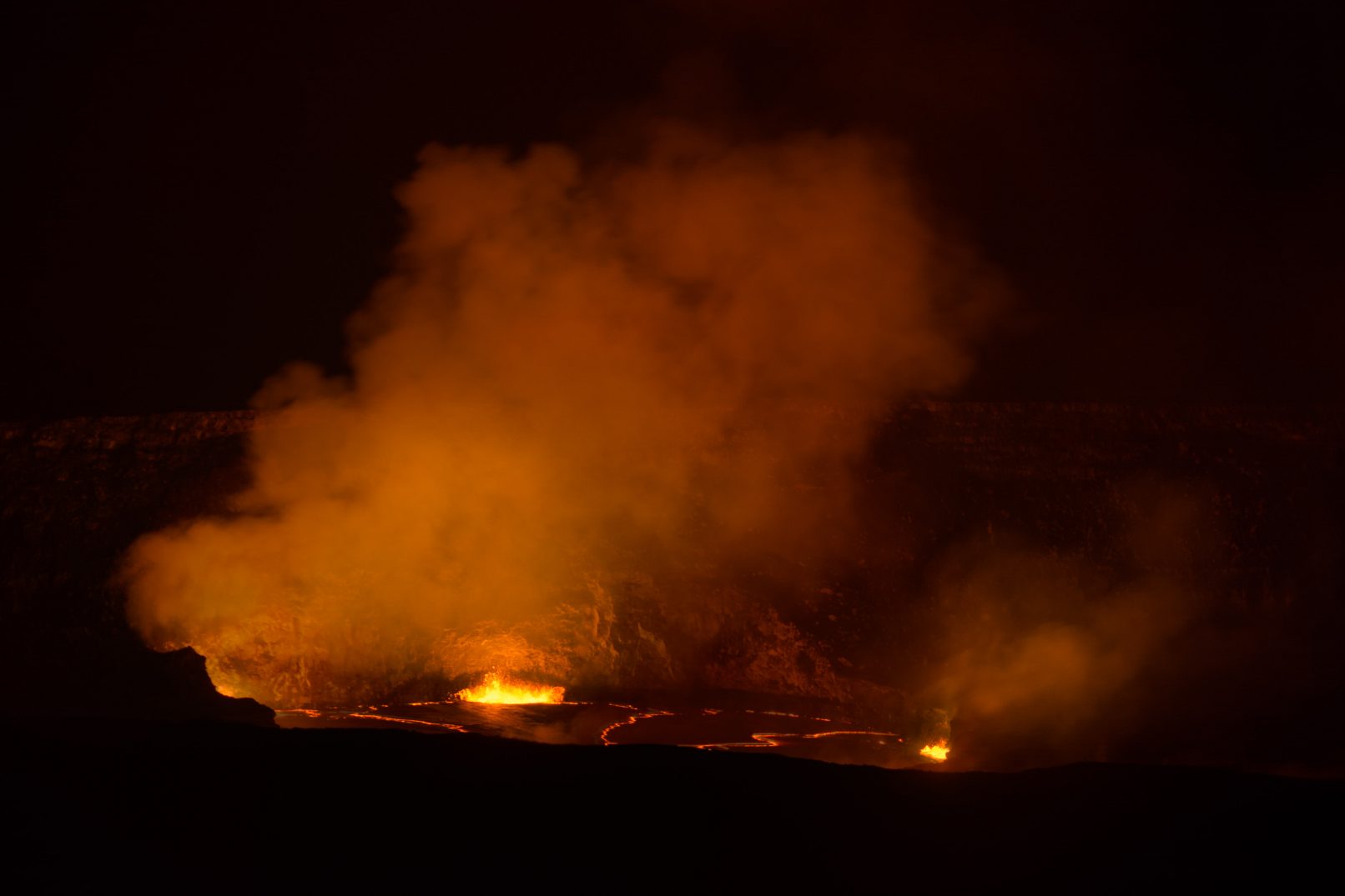 Hawaii Kilauea crater molten lava at night