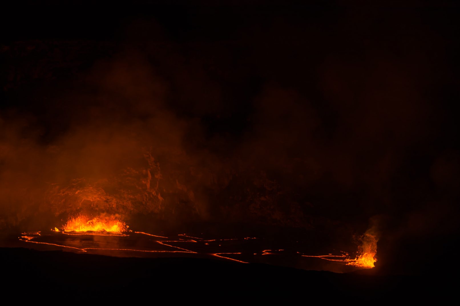 Hawaii Kilauea crater molten lava at night