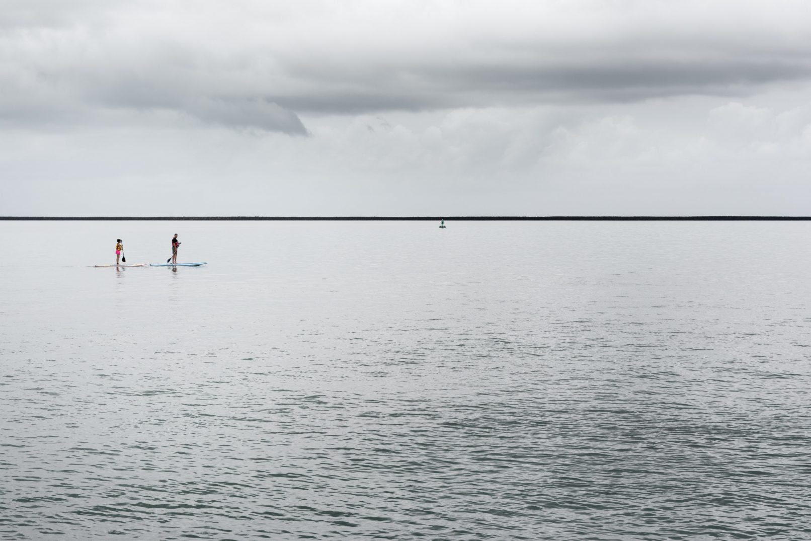 Hawaii paddle boarders on ocean