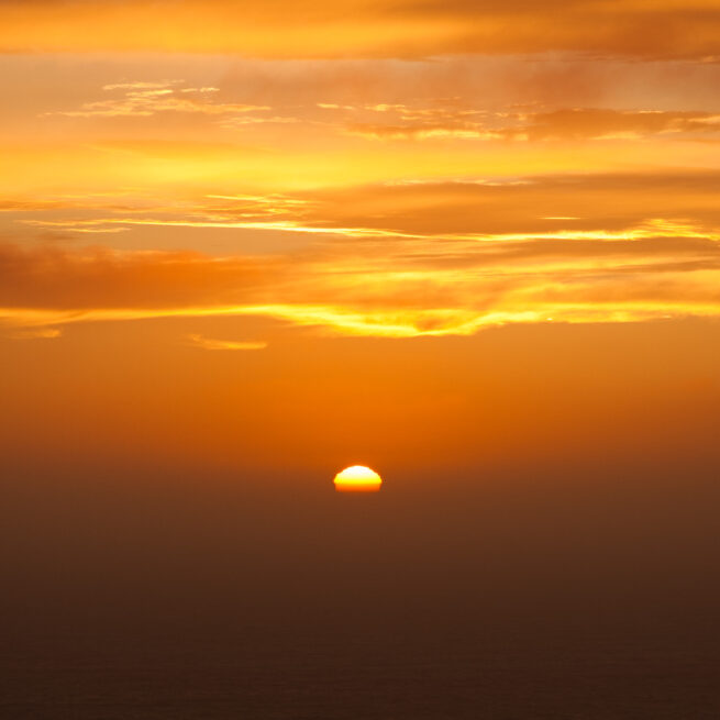 Sunset over Pacific Ocean.
