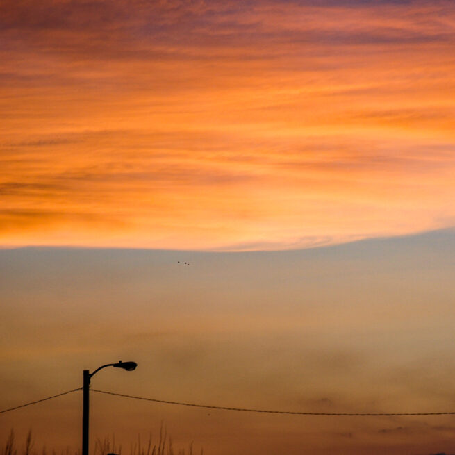 Streetlamp with orange sunset